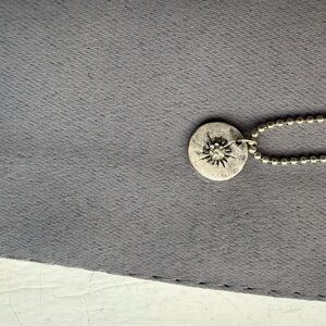 Silver Sunburst Pendant Necklace